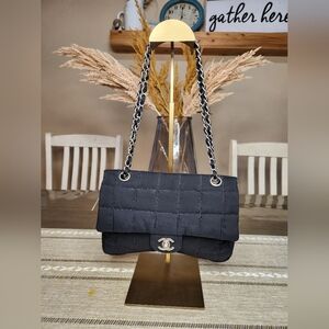 Chanel
Chanel Black Nylon Chocolate Bar Shoulder Bag